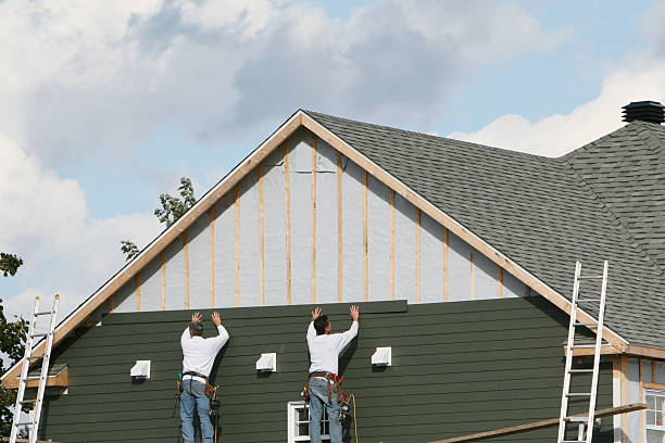 Professional Emergency Siding Repair technician working in Saxton, PA